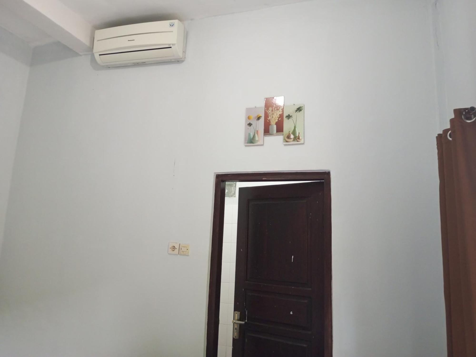 Kri Homestay Kuta  Oda fotoğraf