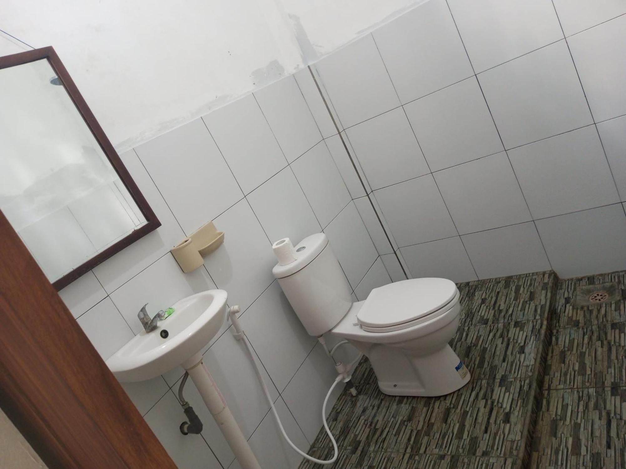 Kri Homestay Kuta  Oda fotoğraf